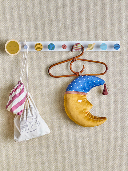 A coat rack symbolising the solar system